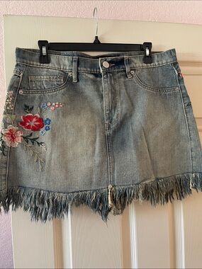 Express Light Blue Denim Mini Skirt with Floral Embroidery and Fringe